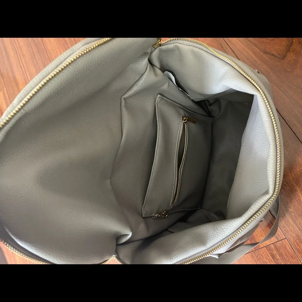 Fawn Design Baby Bag in Taupe Gray with Gold Hardware